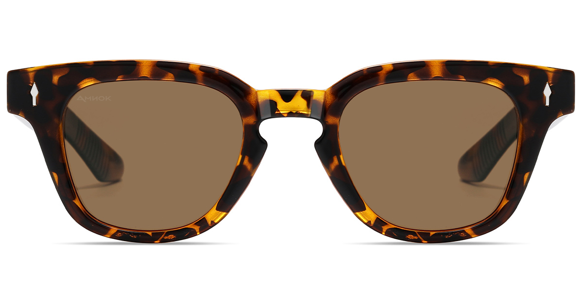 Tortoiseshell sunglasses with brown lenses, featuring a classic rounded square frame and a small silver logo on the temples.