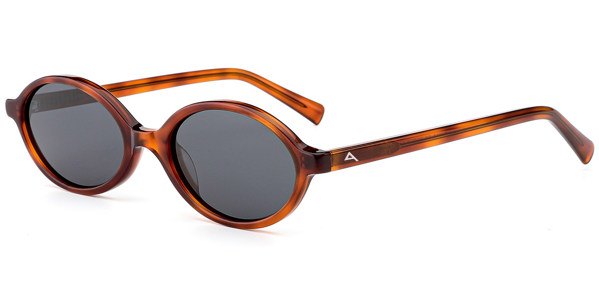 Oval sunglasses with a translucent amber-brown acetate frame and dark gray lenses, shown on a plain white background.