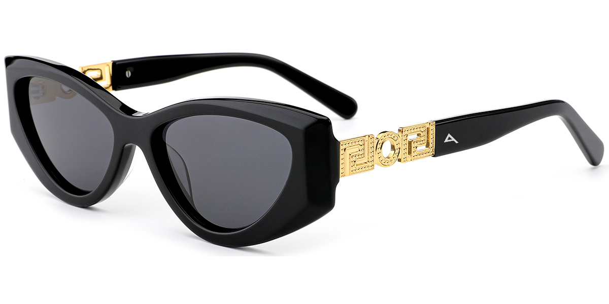 Black cat-eye sunglasses with dark gray lenses and ornate gold-tone decorative hardware on the temples, shown on a plain white background.
