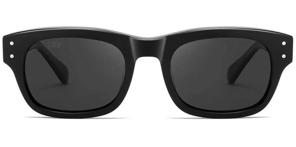 Black sunglasses with dark lenses on a white background