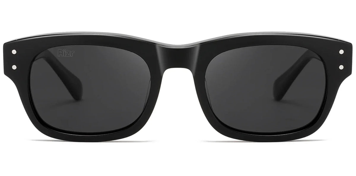 Black sunglasses with dark lenses on a white background