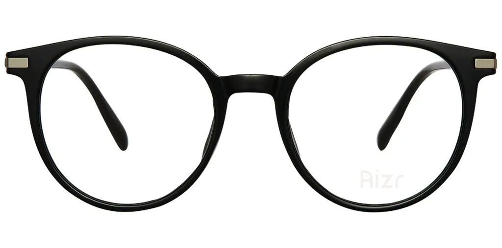 Black eyeglasses with goldmetalic accents on a white background