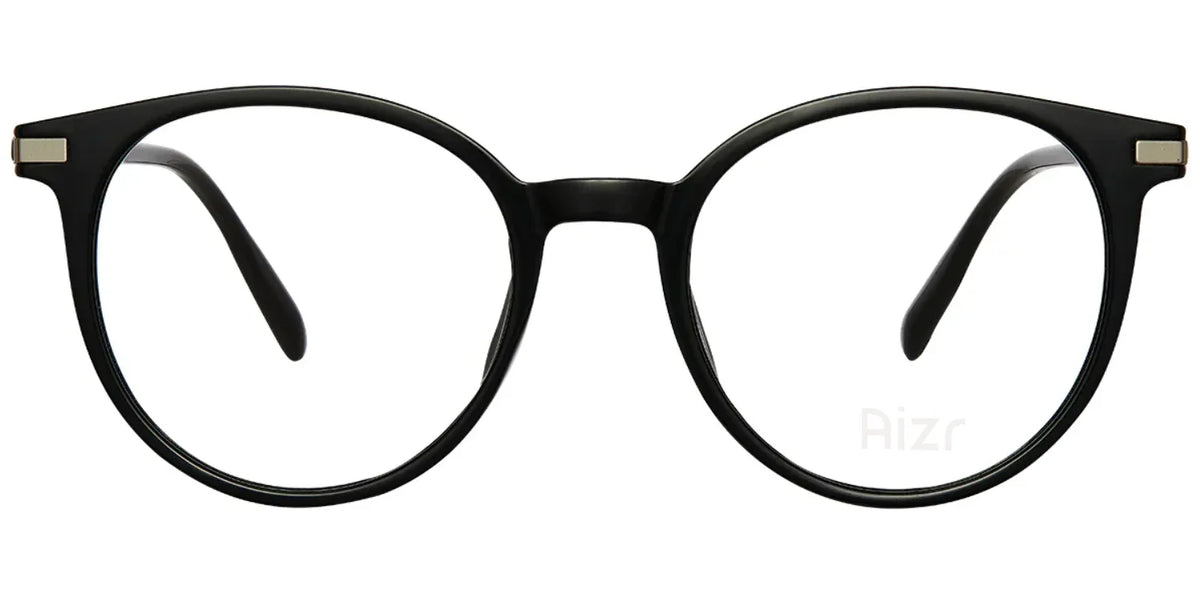 Black eyeglasses with goldmetalic accents on a white background
