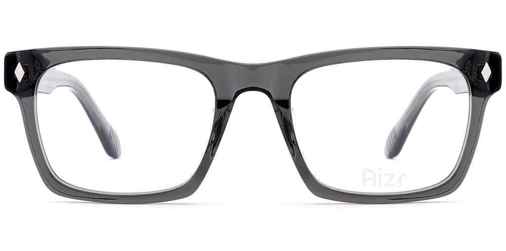Black eyeglasses with clear lenses on a white background