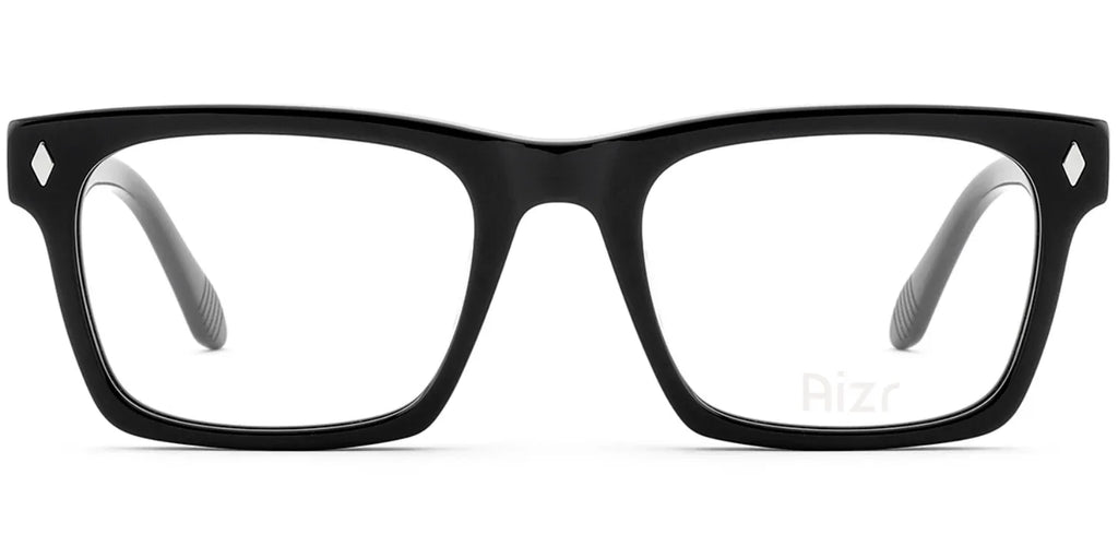 Black eyeglasses with clear lenses on a white background
