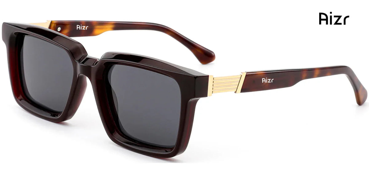 Sunglasses with tortoiseshell frame and dark lenses on a white background, featuring the brand 'Aizr'.