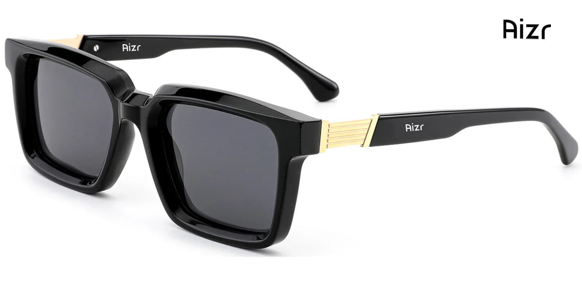 Black sunglasses with gold accents on a white background, featuring the brand 'Aizr'.
