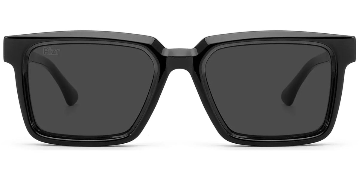 Black sunglasses with dark lenses on a white background
