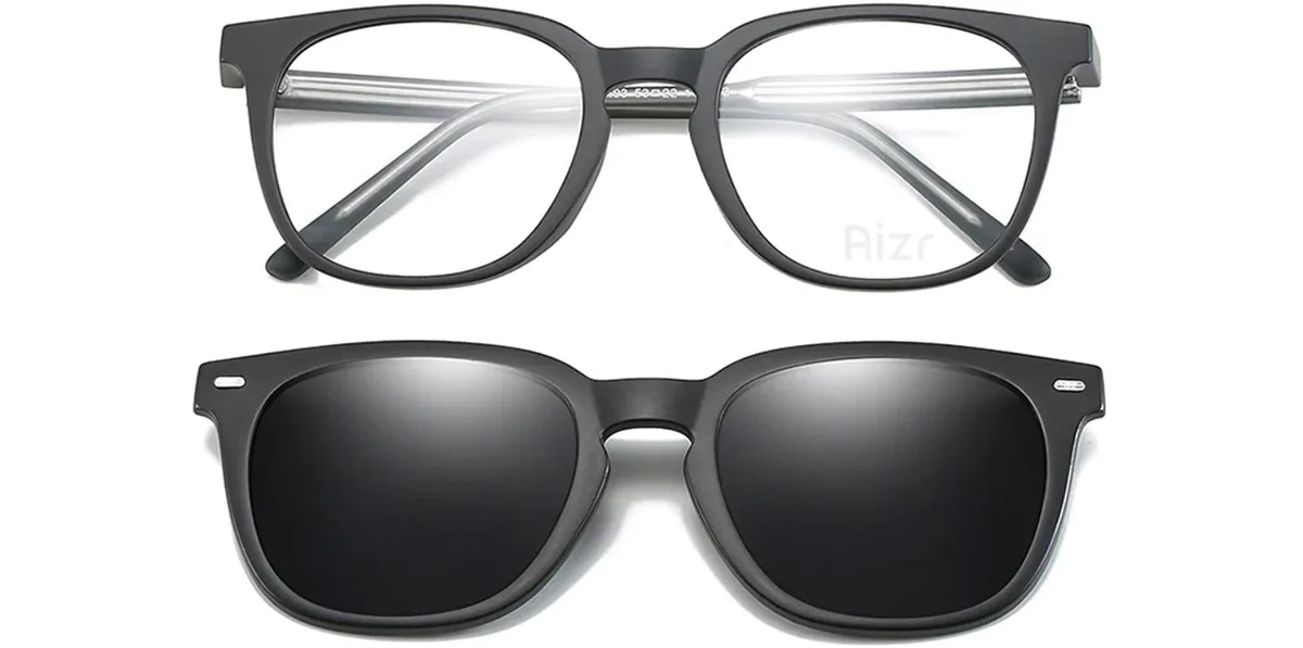 Two pairs of eyewear, one with clear lenses and black frame, the other with dark lenses and black frame, on a white background.