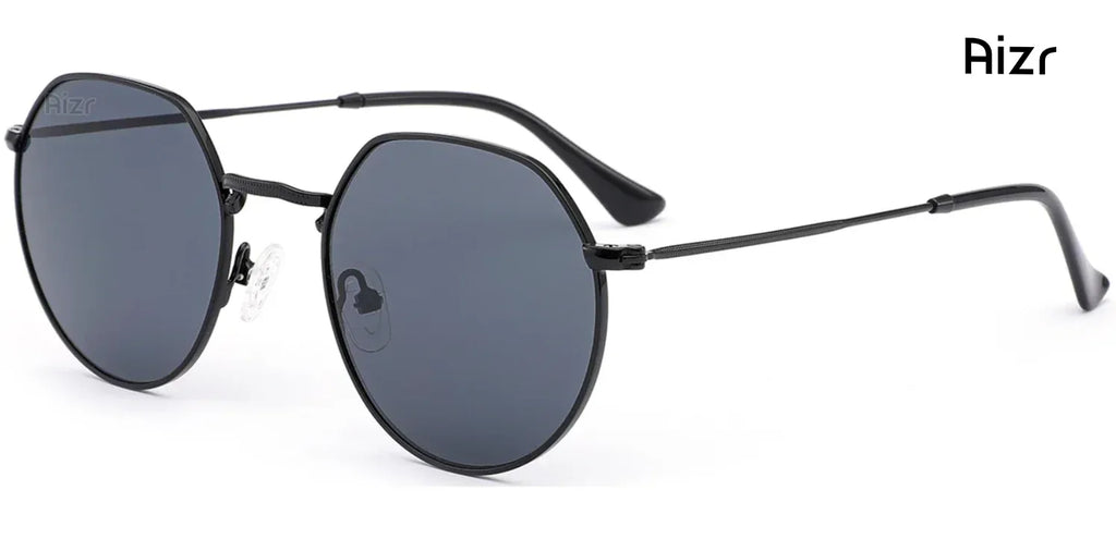 Round sunglasses with dark lenses and thin black frame on a white background, brand 'Aizr' visible.