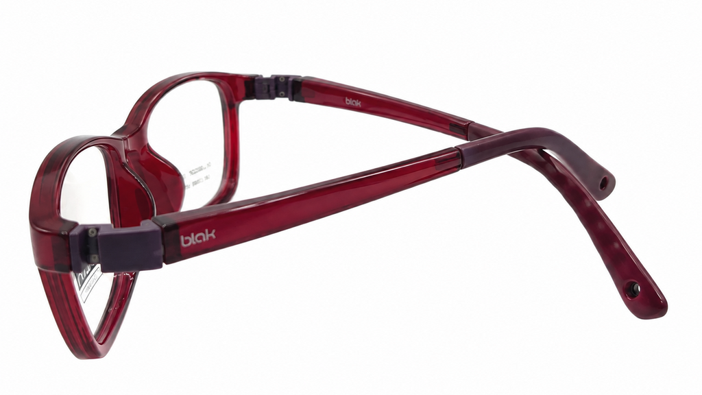 A pair of translucent dark red acetate kids eyeglasses with a wrap-around front and adjustable temple arms, shown from a side angle on a white background.