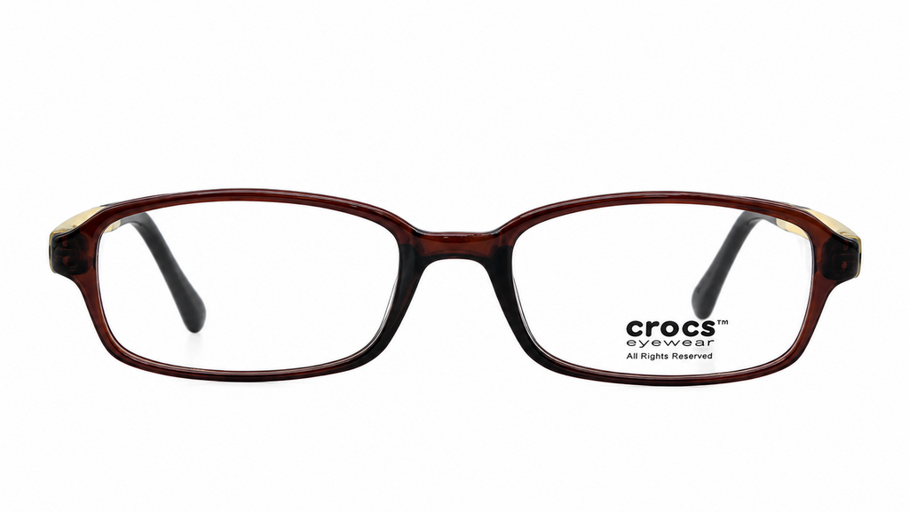 Crocs eyeglasses in a dark brown and black tortoiseshell acetate frame, featuring clear lenses with the Crocs logo printed on the lower right lens.