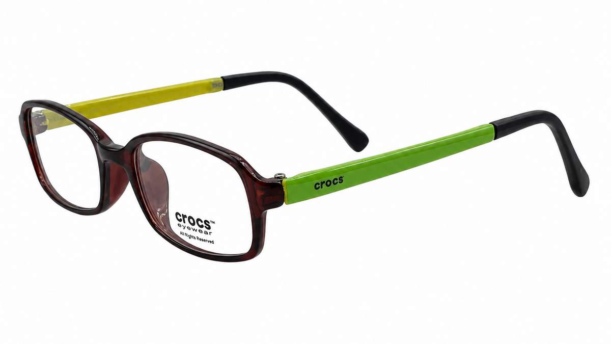 Crocs eyeglasses featuring a translucent dark brown acetate front frame with a vibrant lime green temple arm and a contrasting yellow temple arm, shown on a plain white background.