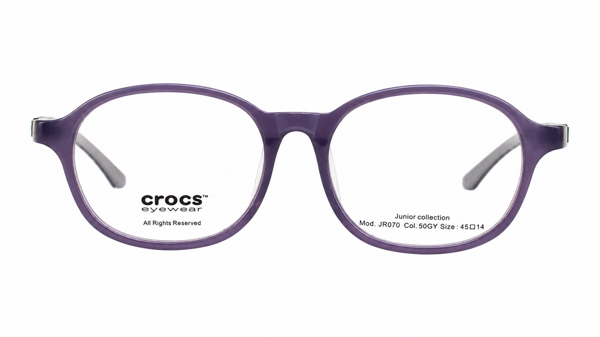 Crocs eyewear round frames in a translucent purple color, shown against a plain white background.
