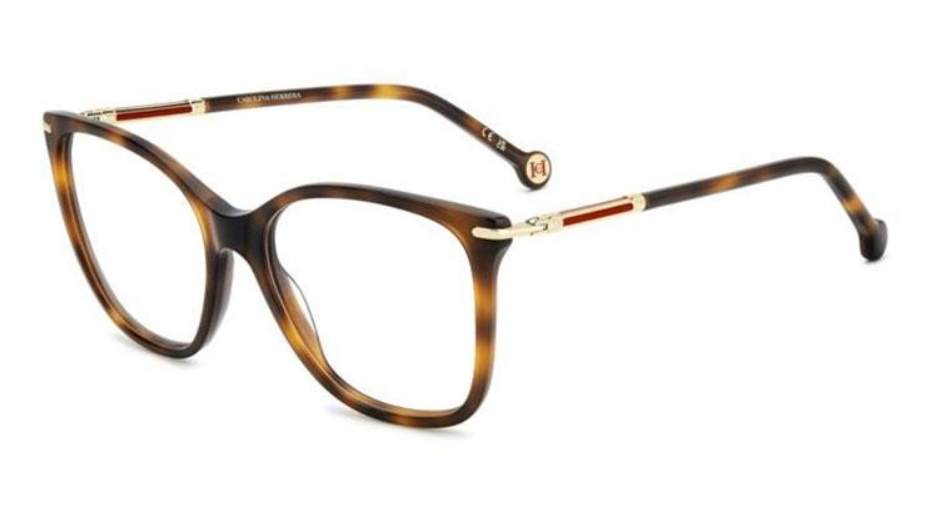  eyeglasses in a classic tortoiseshell acetate, featuring a brown and amber pattern with gold metal accents on the hinges and inner temples.