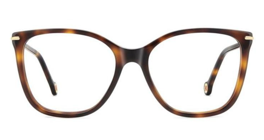 A pair of oversized square eyeglasses with a classic tortoiseshell pattern in brown and amber, featuring small gold metal accents on the temples.