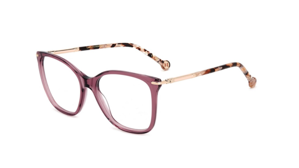 A pair of women's eyeglasses featuring a translucent dusty rose purple acetate frame with gold metal temples and tortoiseshell-patterned earpieces, shown on a plain white background.