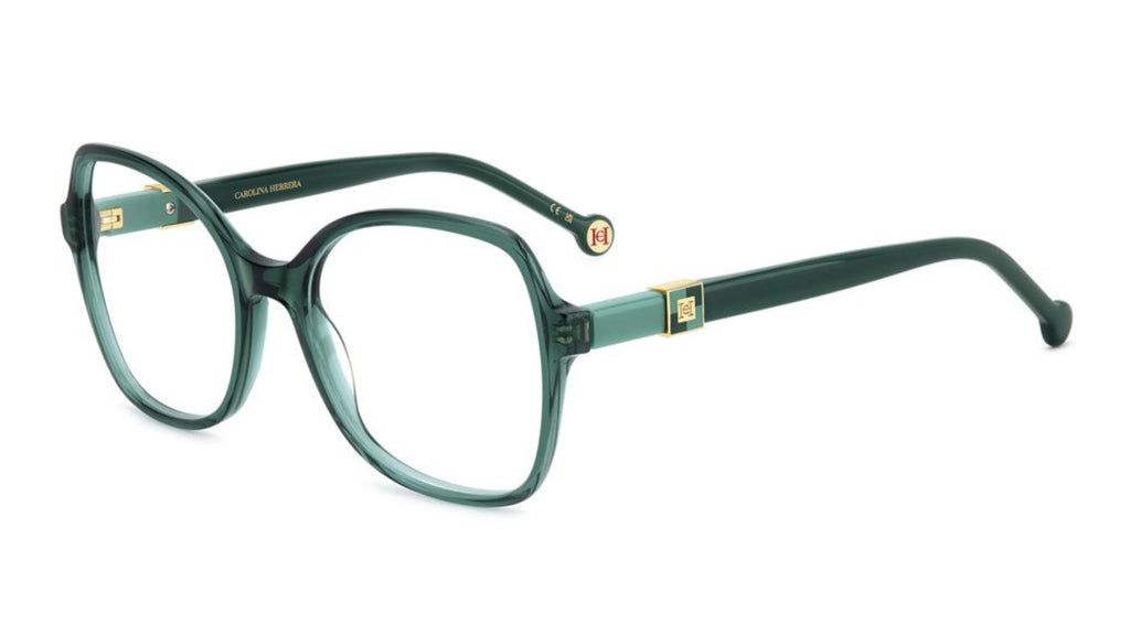Oversized cat-eye eyeglasses in translucent dark green acetate with gold metal accents on the hinges and temples, shown on a plain white background.