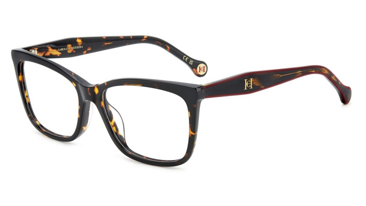 A pair of designer eyeglasses featuring a bold black and brown tortoiseshell pattern on the front frame and temples, with a thin red accent line along the temple arms.
