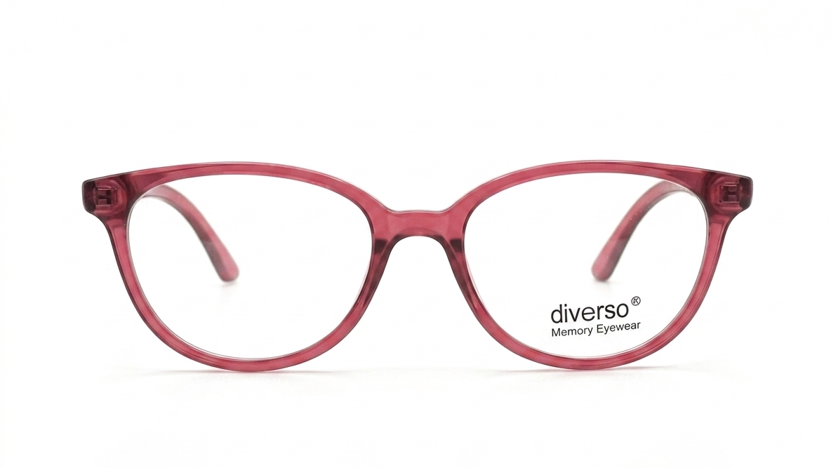 A pair of round cat-eye eyeglasses with translucent dusty rose pink frames and clear lenses, featuring the 'diverso Memory Eyewear' logo on the lower right frame, set against a plain white background.