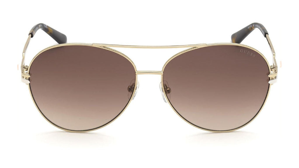 Sunglasses with gold frame and brown lens