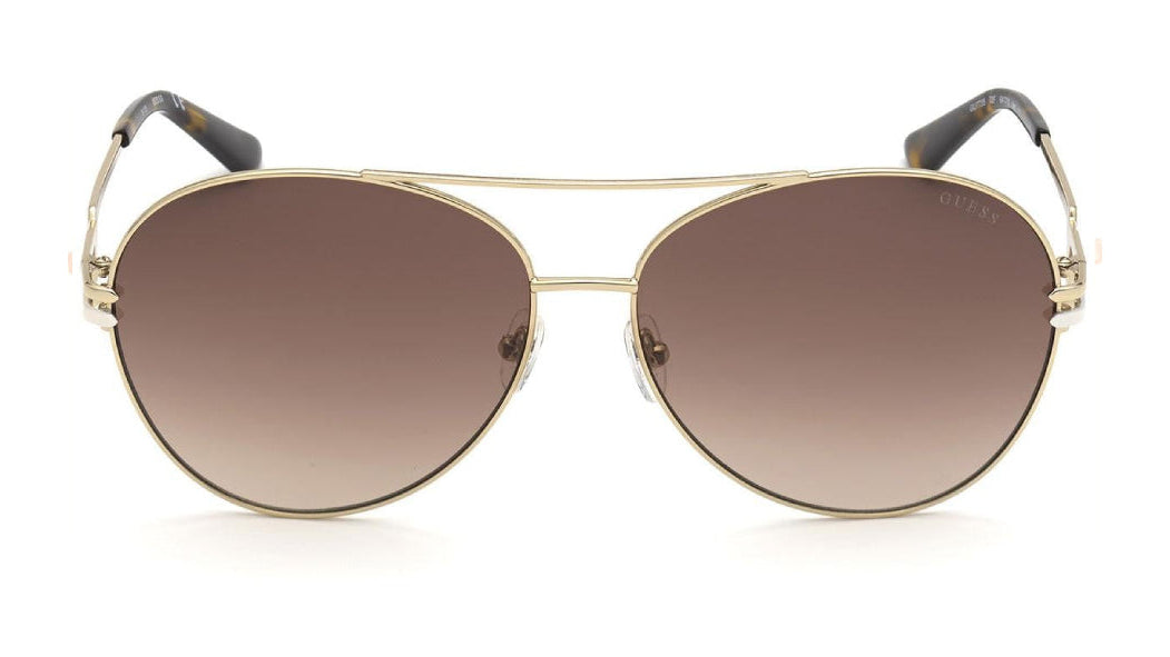 Sunglasses with gold frame and brown lens