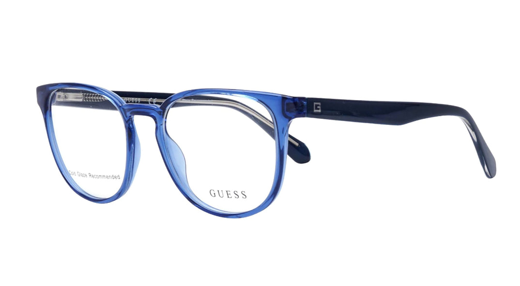 GUESS eyeglasses featuring a translucent blue acetate frame with dark navy temples, shown on a plain white background.