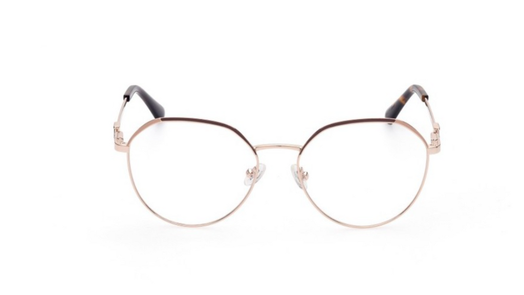 Oversized round metal eyeglass frames with thin rose gold-toned rims and dark temple tips, shown on a plain white background.