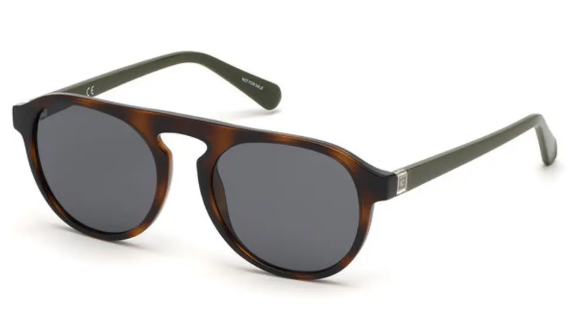 A pair of round aviator-style sunglasses with a translucent dark brown and black tortoiseshell frame and dark gray lenses, shown on a plain white background.