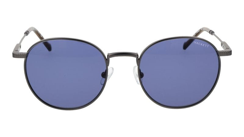Round sunglasses with dark blue lenses and a thin black metal frame, featuring silver-toned temples with a textured pattern.