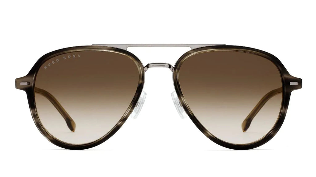 A pair of aviator-style sunglasses with a tortoiseshell frame and brown gradient lenses, featuring the BOSS logo on the upper left frame, set against a plain white background.