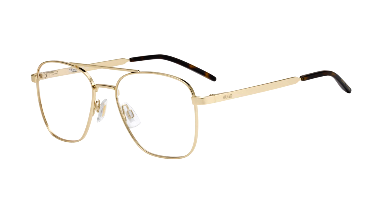Gold metal aviator-style eyeglasses with clear lenses and dark tortoiseshell temple tips, shown on a plain white background.