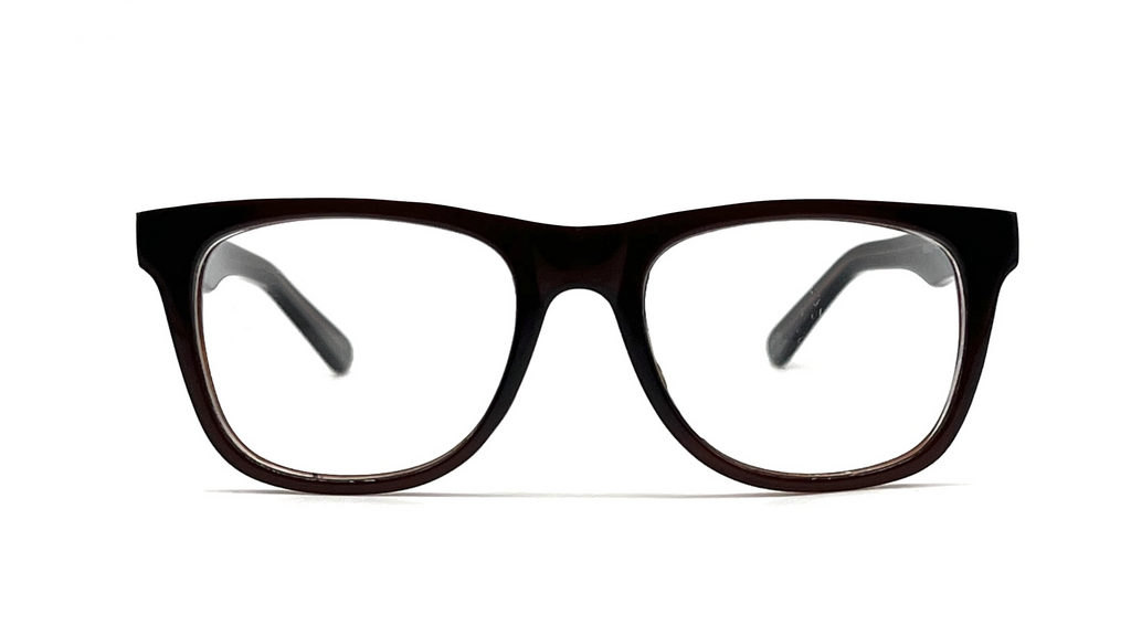 A pair of thick, dark brown acetate eyeglass frames with clear lenses, shown from a front-facing perspective on a solid white background.