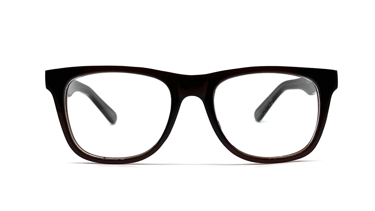 A pair of thick, dark brown acetate eyeglass frames with clear lenses, shown from a front-facing perspective on a solid white background.