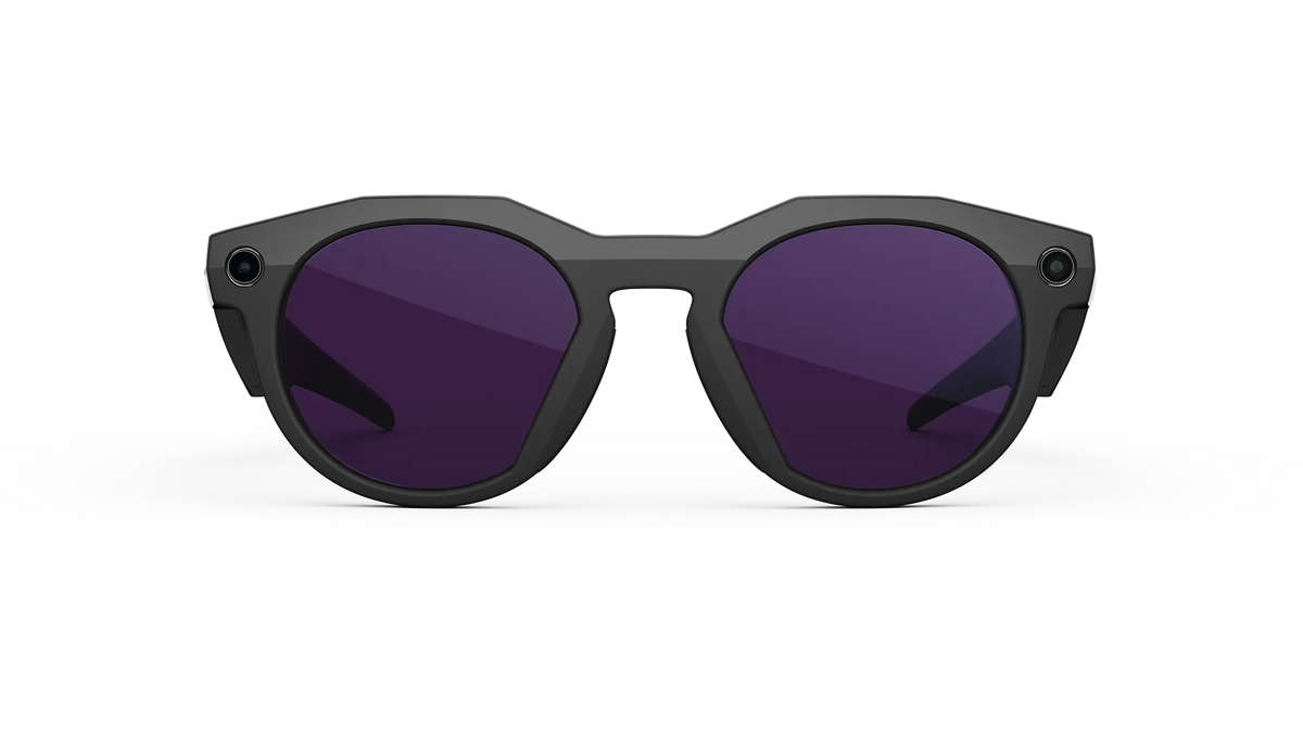 Black sunglasses with dark lenses on a white background
