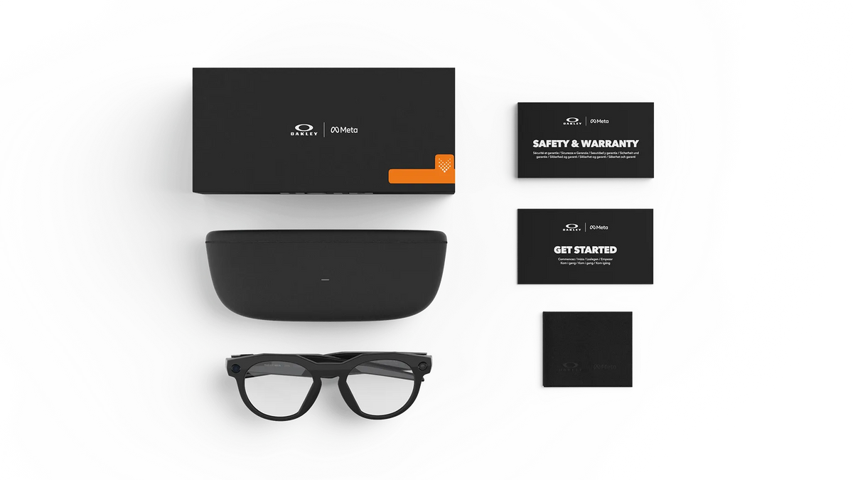 Eyeglasses with case, warranty card, and other accessories on a white background