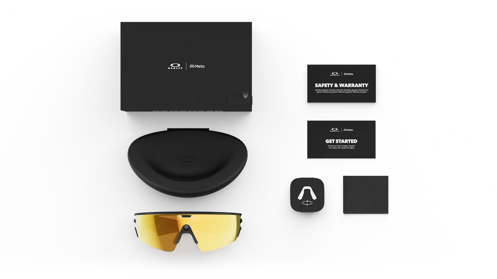 Oakley Ai glasses-vanguard  Sunglasses with black case, warranty card, and branded accessories on a white background