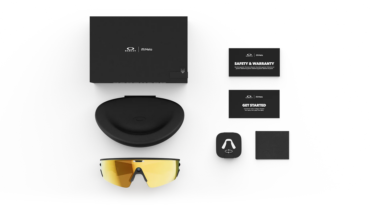 Oakley Ai glasses-vanguard  Sunglasses with black case, warranty card, and branded accessories on a white background