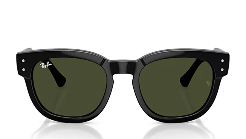 Ray-Ban sunglasses with a glossy black frame and dark olive green lenses, shown against a plain white background with a subtle reflection.