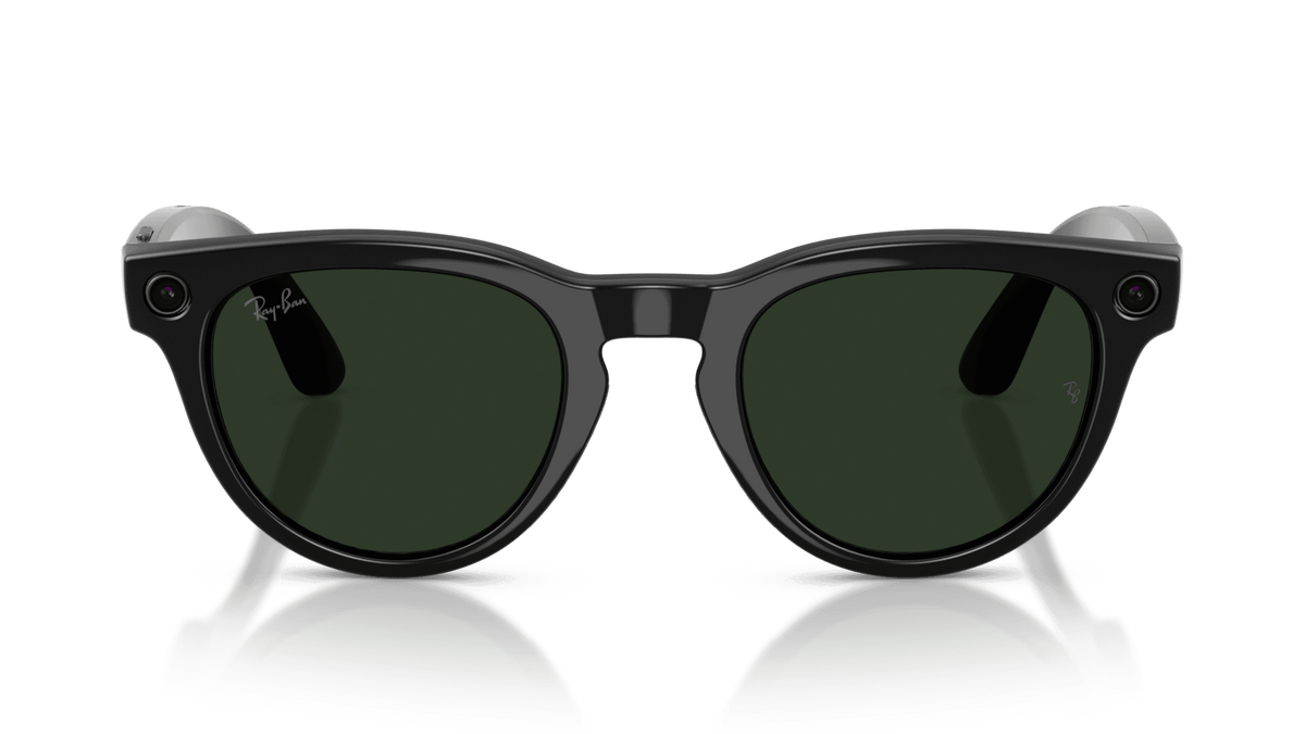 Ray-Ban Meta Headliner Shiny Black -Transitions- Gen 2   Sunglasses with a reflective surface on a gradient blue background