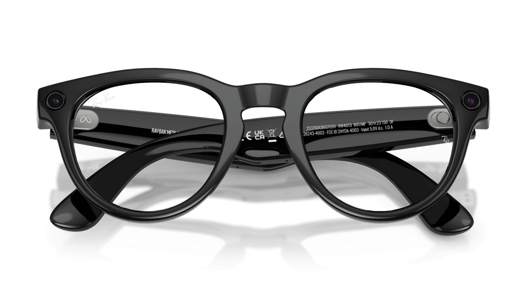 Ray-Ban | Meta Headliner Shiny Black -Transitions Gen 2  Black eyeglasses on a reflective surface with a dark background