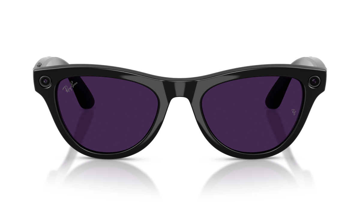 Ray-Ban | Meta Skyler Shiny Black -Transitions Gen 2  Black sunglasses with purple lenses on a reflective surface against a gradient background