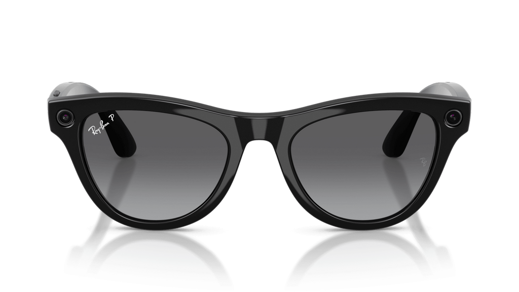 Ray-Ban | Meta Skyler Shiny Black - Gen 2  Black sunglasses on a reflective surface with a clear background