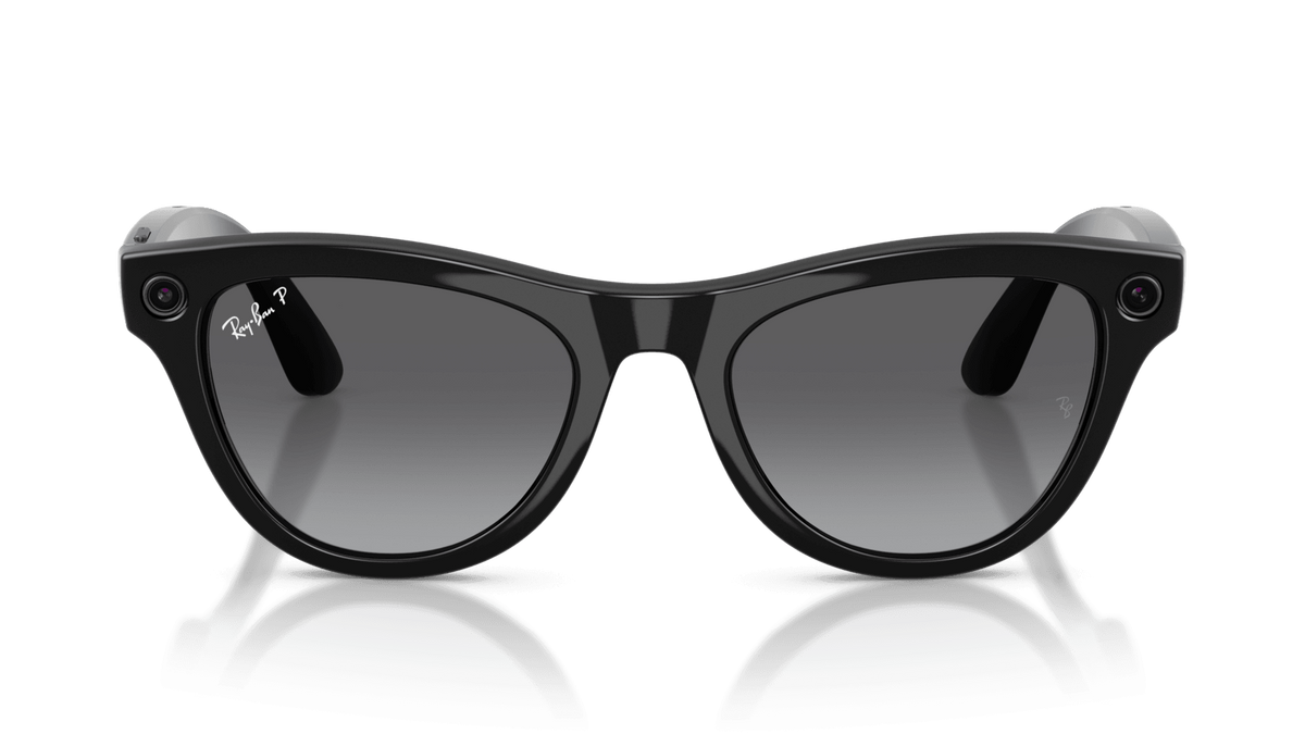 Ray-Ban | Meta Skyler Shiny Black - Gen 2  Black sunglasses on a reflective surface with a clear background
