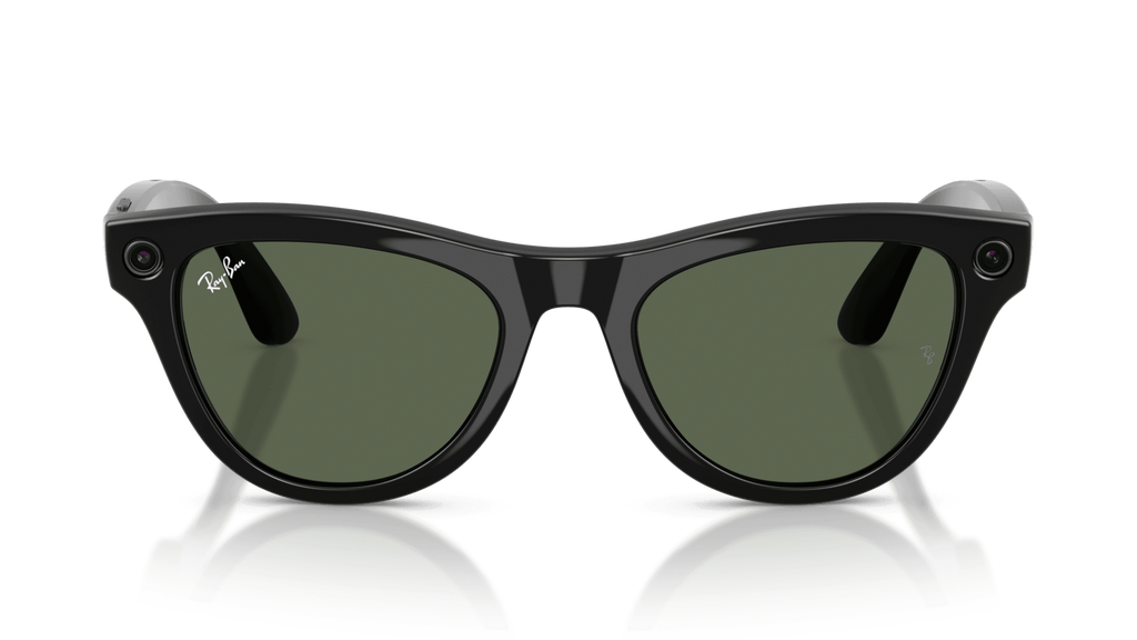 Ray-Ban | Meta Skyler Shiny Black - Gen 2  Black sunglasses with green lenses on a reflective surface against a blue gradient background