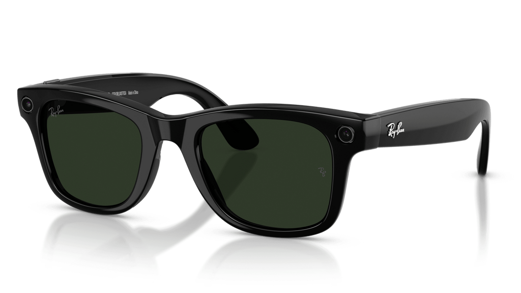 Ray-Ban Meta Wayfarer Shiny Black -Transitions- Gen 2   Black sunglasses with green lenses on a reflective surface