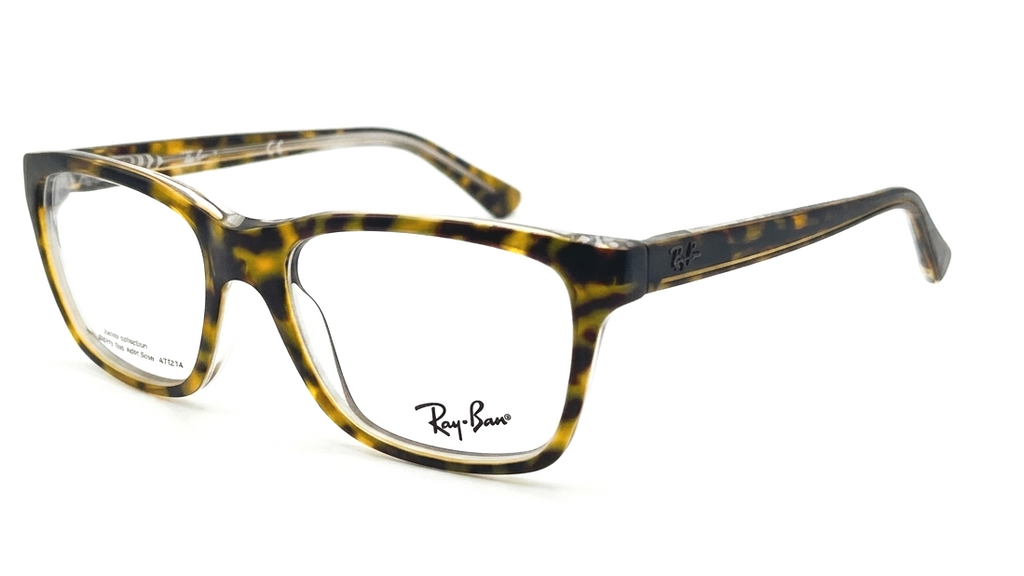 Ray-Ban eyeglasses in a classic tortoiseshell pattern, featuring a dark brown and amber-brown mottled design with a signature 'Ray-Ban' logo printed on the lower right lens.
