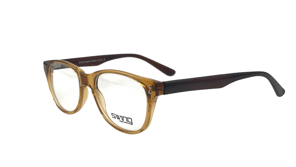 A pair of eyeglasses with a translucent amber-brown acetate frame and dark brown temples, shown on a plain white background. The brand name 'swing' is printed on the lower part of the left lens.