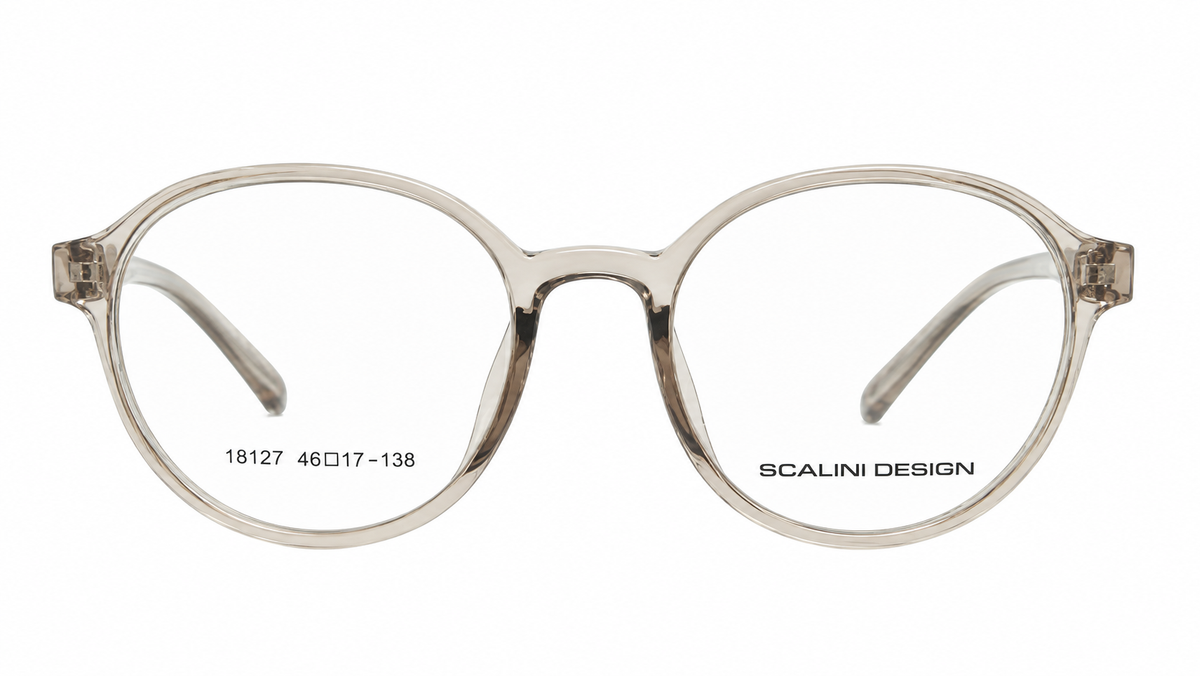 Round eyeglasses with a translucent smoky clear acetate frame and clear lenses, featuring the brand name 'SCALINI DESIGN' printed on the lower right side of the lens.