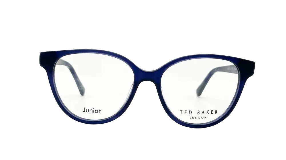 A pair of Ted Baker Junior eyeglasses with a dark blue acetate frame and clear lenses, shown against a plain white background.